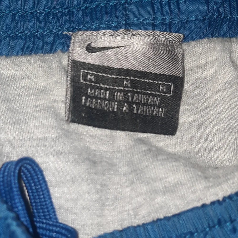 Nike Lined Windbreaker Pants Men Medium Navy Blue Warm-Ups Nylon Swoosh Zip Y2K